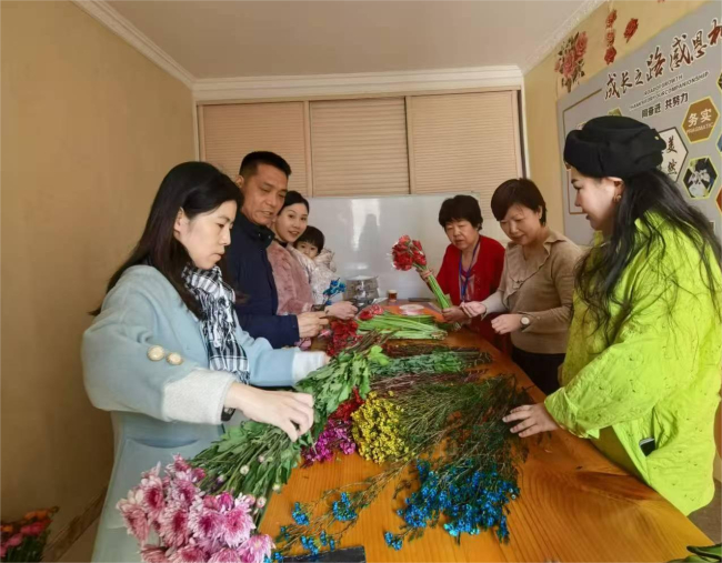 民建石家莊市委裕華三支部組織開展三八國際勞動婦女節活動.jpg